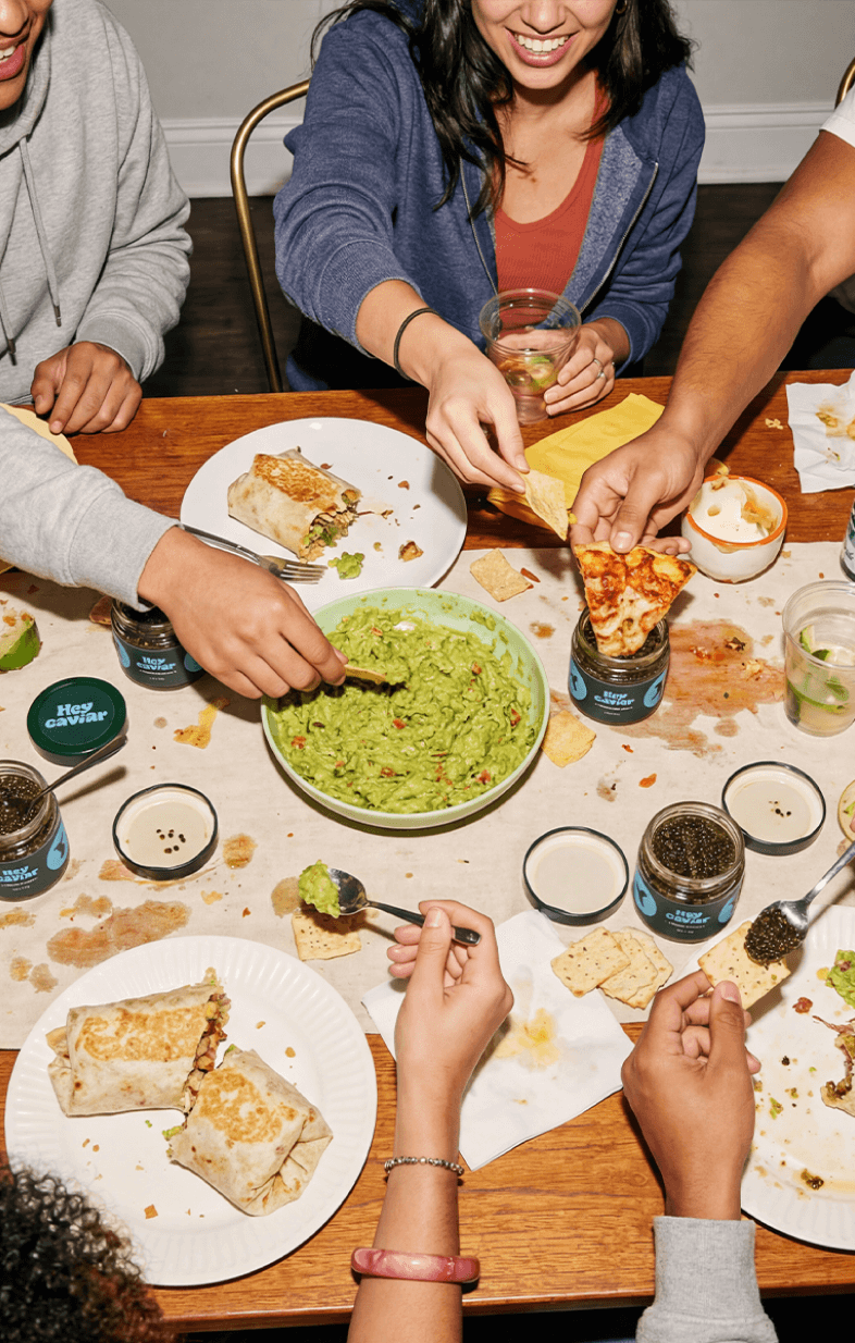 Experiential lifestyle photography showcasing Hey Caviar product label design created by Verve Concepts.